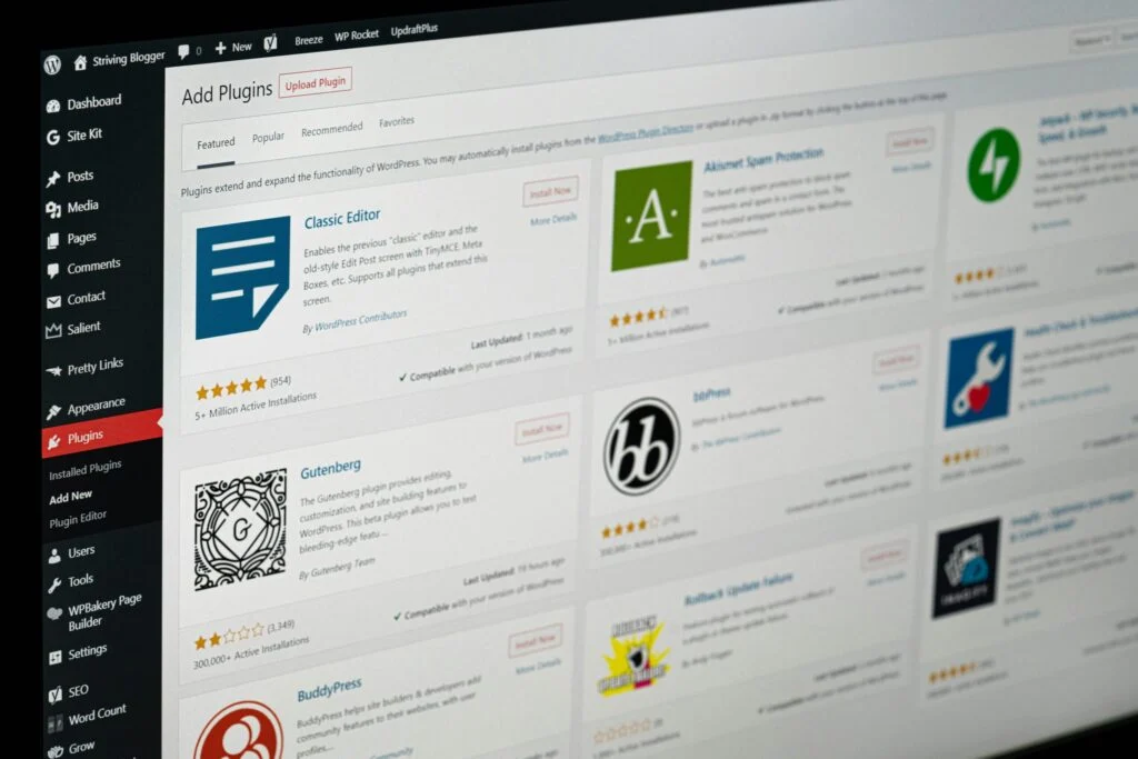 The image “200920261789867018.jpeg” shows a computer screen displaying the WordPress admin dashboard, featuring the “Add Plugins” page with various plugin options, a search bar, and sidebar menu items visible on the left.